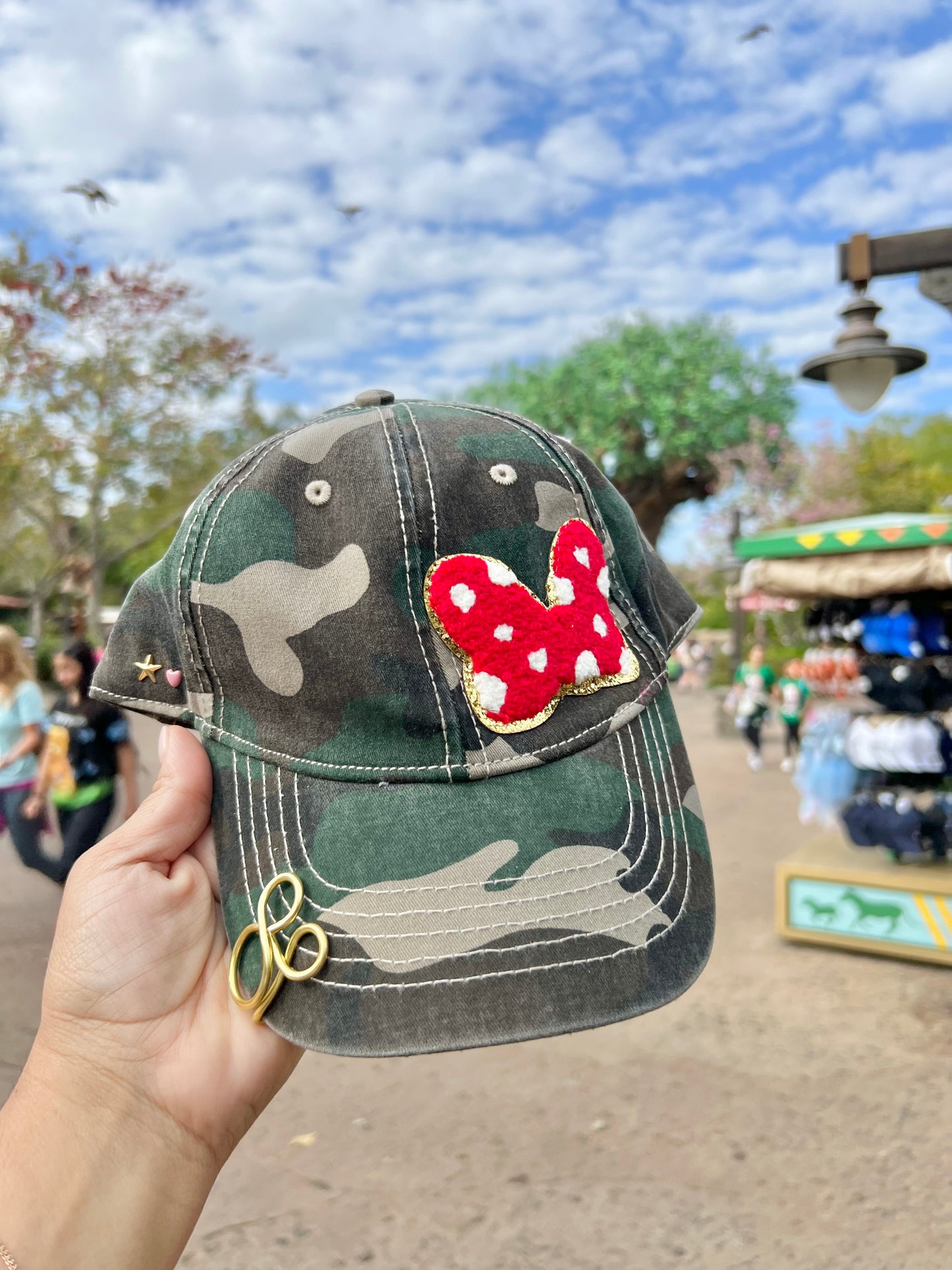 Camouflage dad hat with red chenille polka dot bow